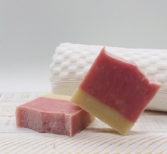 Qrema Hibiscus Soap - Qrema Beauty Products Let this amazing soap take you to a tropical paradise in your own shower!   Hibiscus has properties that are anti aging, moisturizing, anti bacterial, anti viral.  ingredients: coconut oil, palm oil, olive oil, fragrance essential oils, mica powder mixed with almond oil.  Large soap bar.